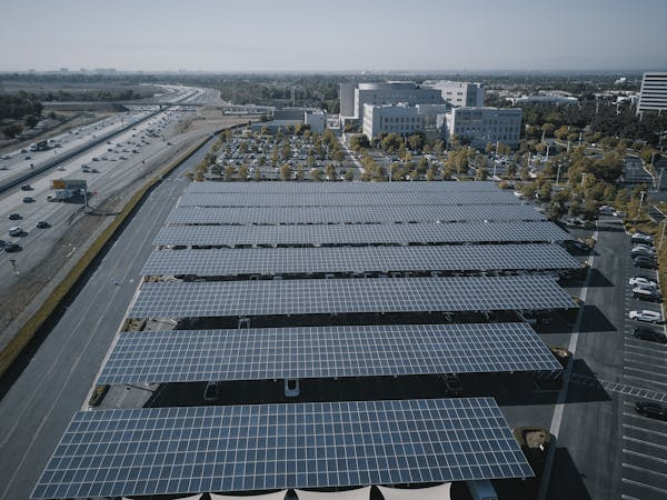 plates Reliable solar panels are installed in a commercial area. Call us now for a free estimate.