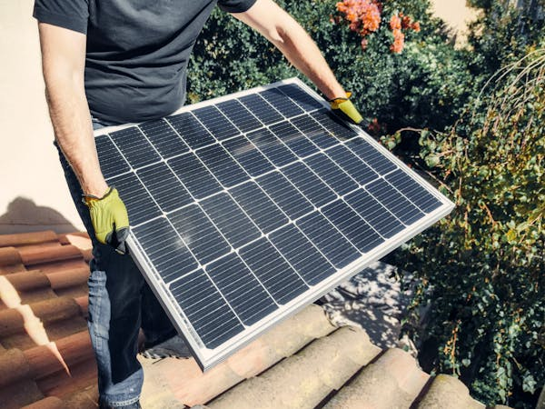 yte Expert solar installers in Hampton Bays are completing the solar panel installation at a residential building. Call now for an estimate.<br />